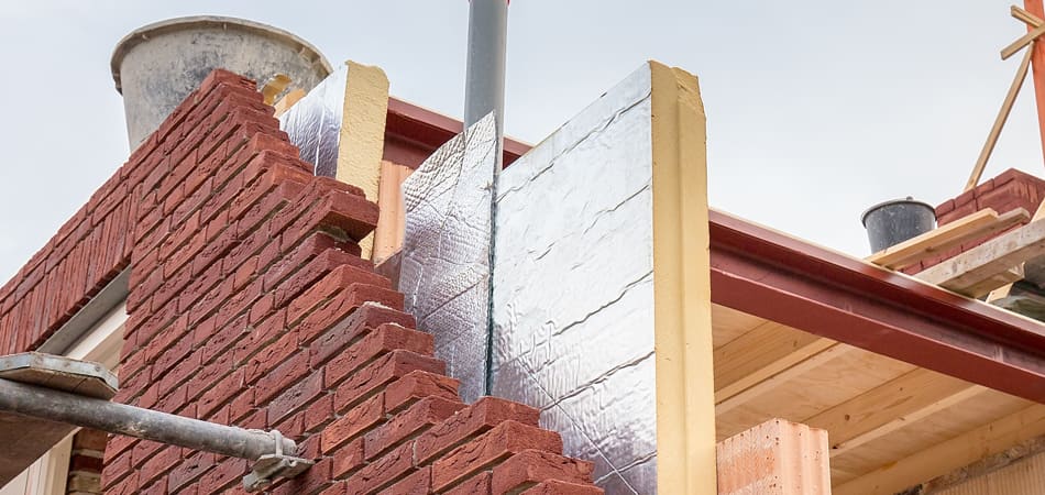 Verbouwing van een huis waarbij de isolatie wordt verbeterd