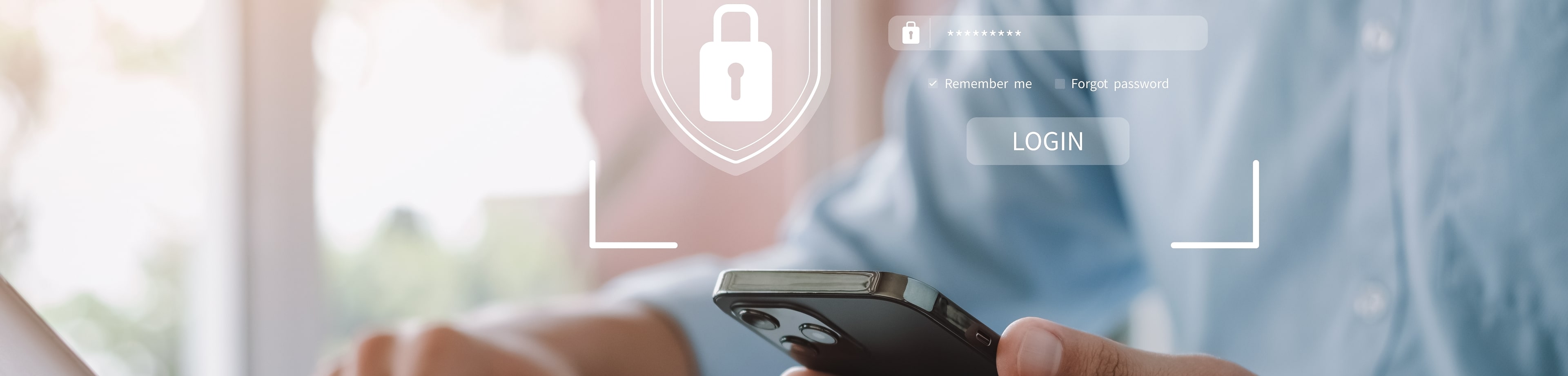 Iemand heeft een mobiele telefoon in zijn hand en wil veilig inloggen